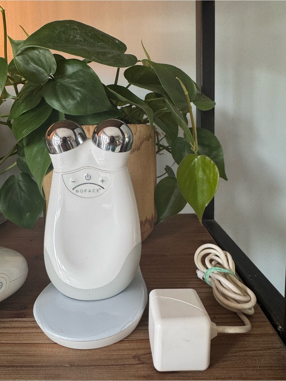 NuFace White Handheld Facial Sculpting Device with Silver Spheres